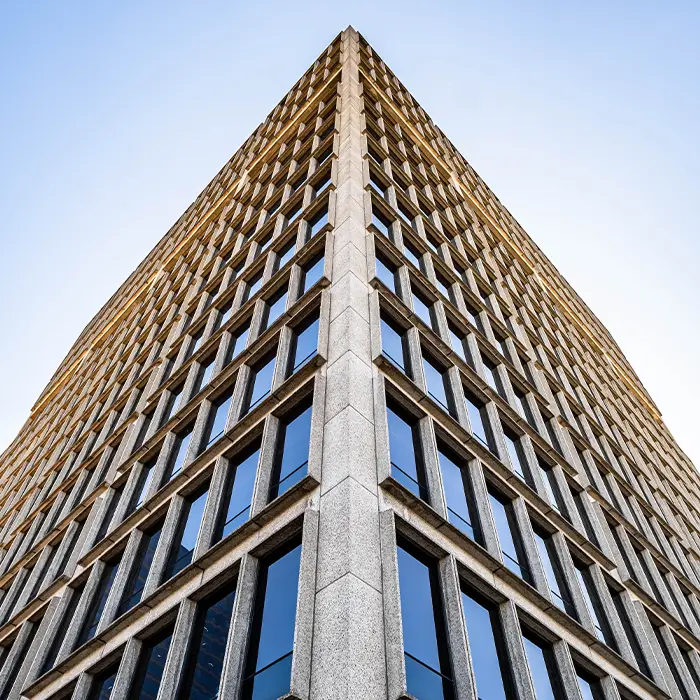 A dramatic photo of Danna McKitrick's office building, looking up from street level.